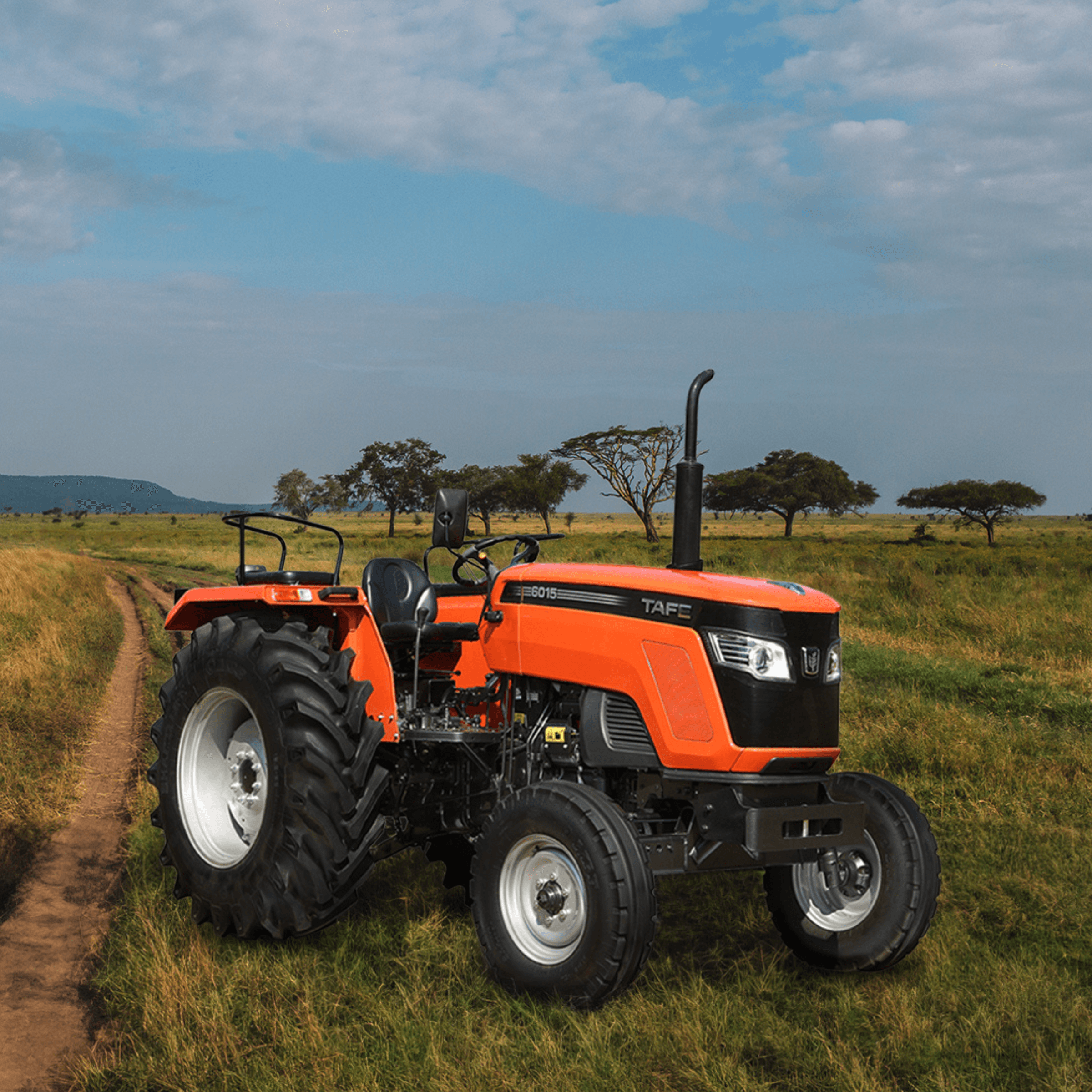 TAFE-6515-4WD-Tractor-Large-Tires-Farming-Landscape